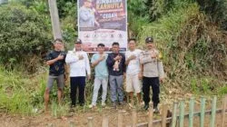 Bhabinkamtibmas Polsek Asera dan  Pemdes Wawolimbue Pasang Baliho Himbauan, Cegah Karhutla